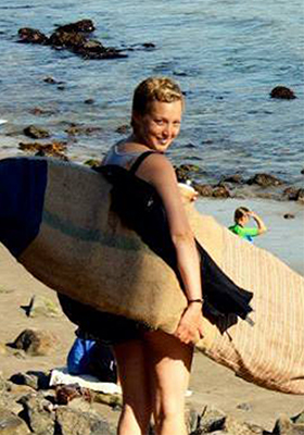 Jasmine-Martin-surfboard-at-the-beach